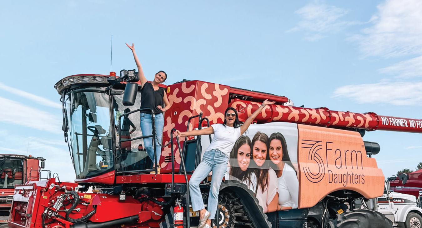 Branding, branding, branding! One of the family combines (now referred to as Peachy) is professionally wrapped with Three Farm Daughters artwork. (Photo courtesy of Grace Lunski)